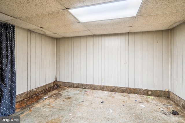 basement featuring a drop ceiling