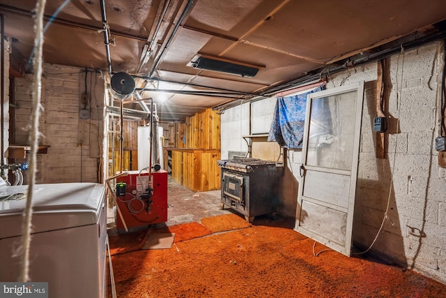 basement with washer / clothes dryer and gas water heater