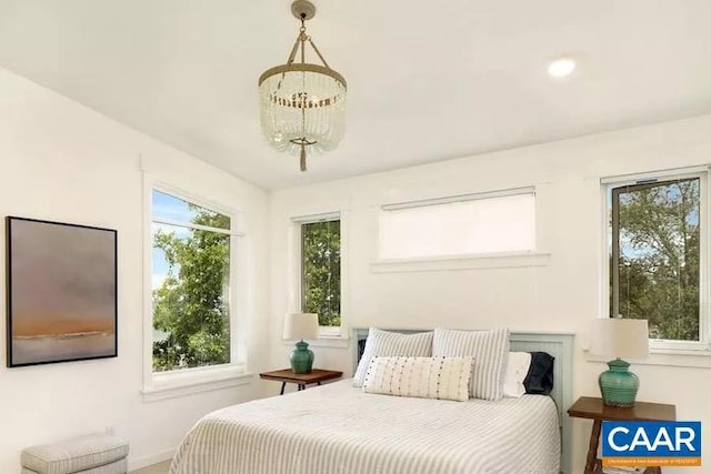 bedroom featuring a chandelier