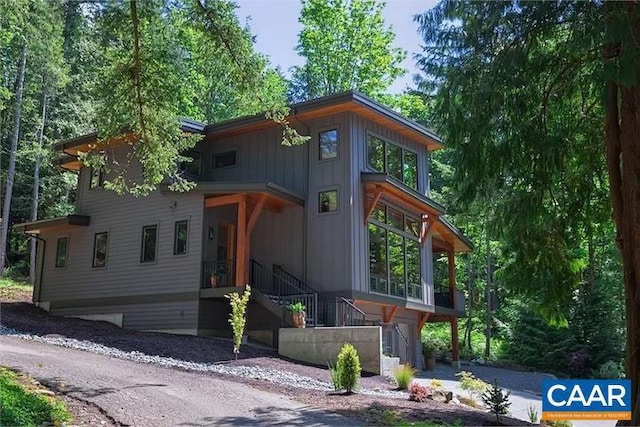 view of jungle gym featuring a sunroom