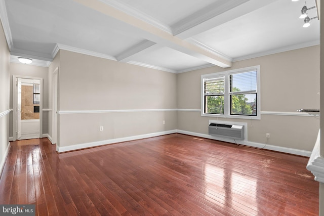 unfurnished living room featuring beam ceiling, a wall mounted AC, dark hardwood / wood-style flooring, and ornamental molding