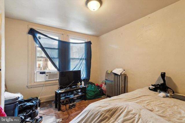 bedroom with parquet floors