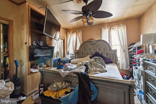 bedroom featuring ceiling fan