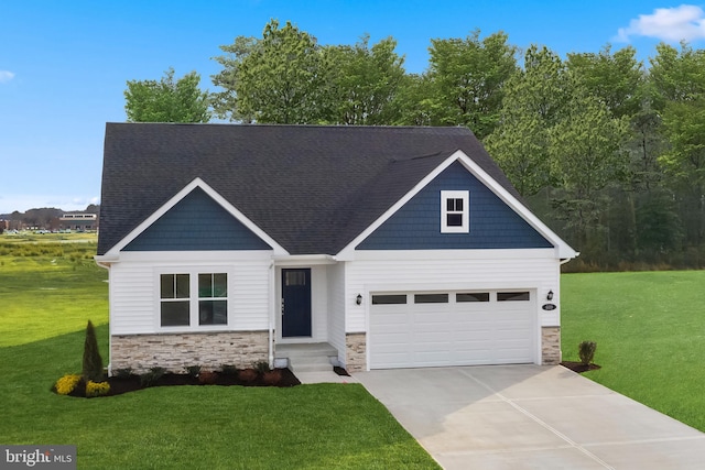 craftsman house with a garage and a front lawn