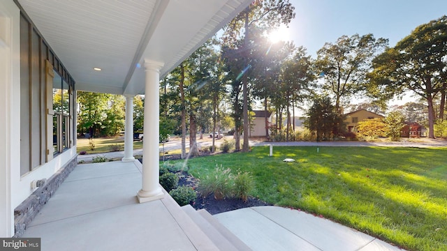 view of yard featuring a porch