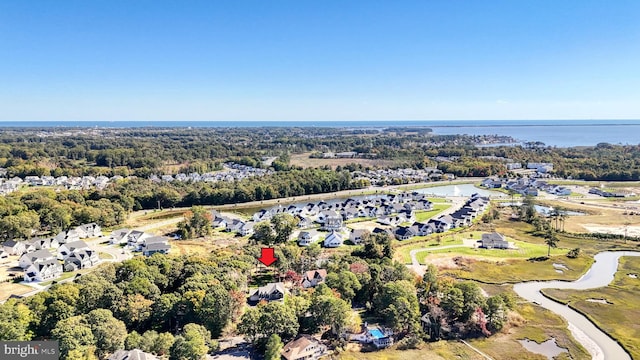 aerial view featuring a water view and a residential view