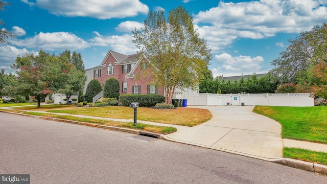 view of front of home with a front yard