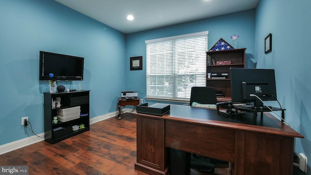 home office with dark wood-type flooring