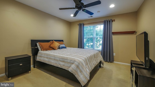 carpeted bedroom featuring ceiling fan