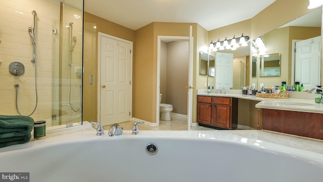 full bathroom with tile patterned floors, vanity, toilet, and shower with separate bathtub