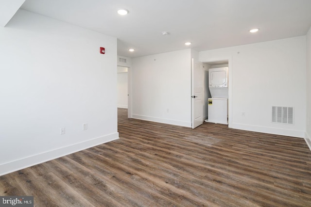 unfurnished room with dark hardwood / wood-style floors