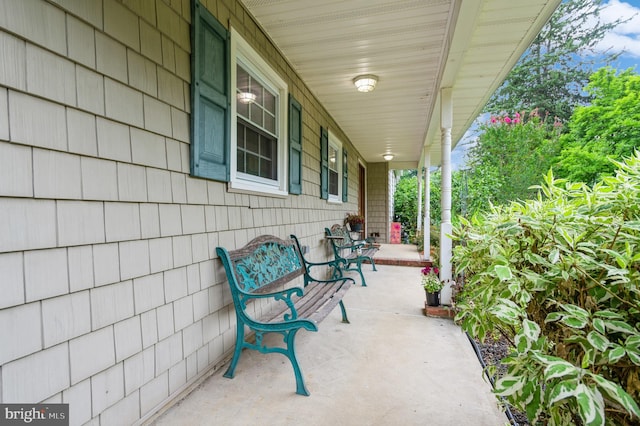 view of patio featuring a porch