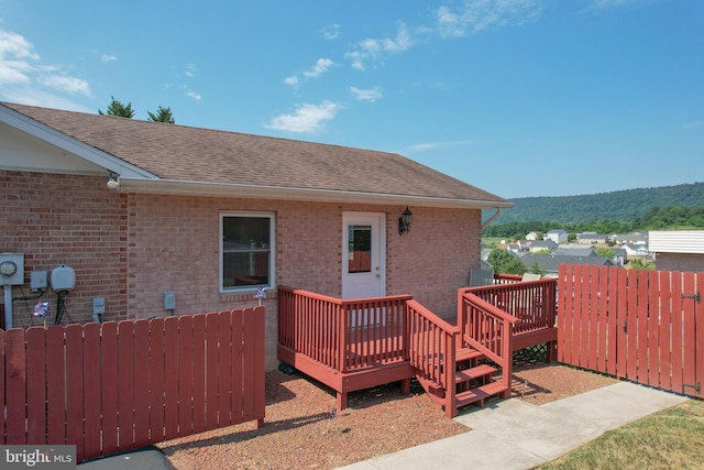 rear view of house with a deck