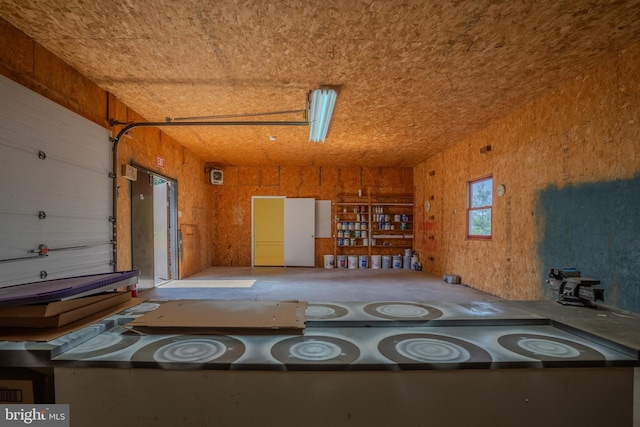 kitchen with wood walls