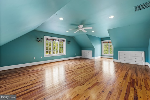 bonus room with ceiling fan, light hardwood / wood-style flooring, and lofted ceiling