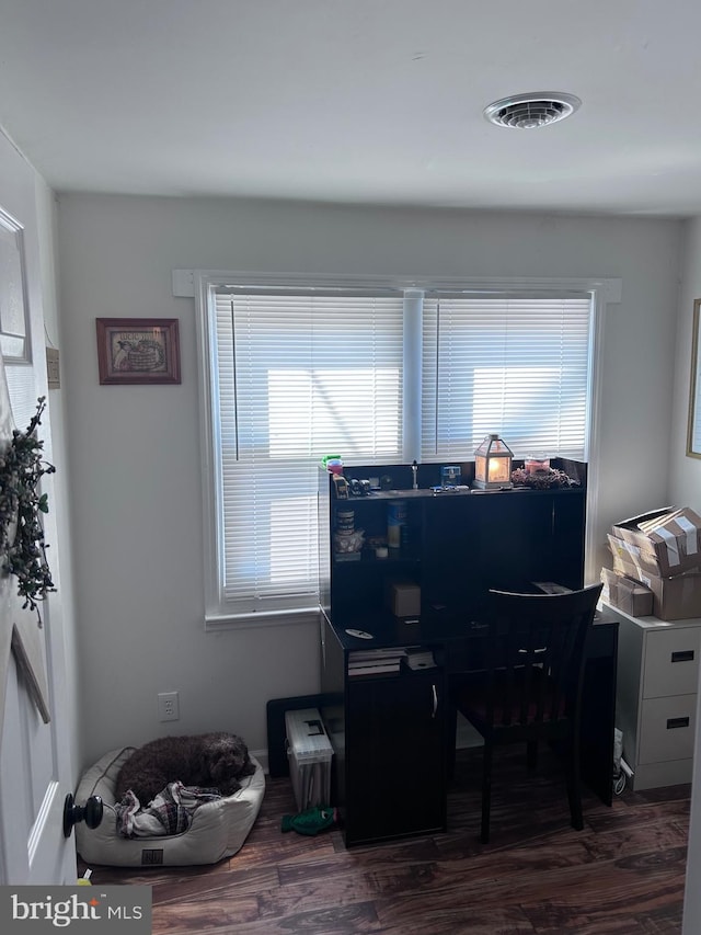 home office featuring dark hardwood / wood-style flooring