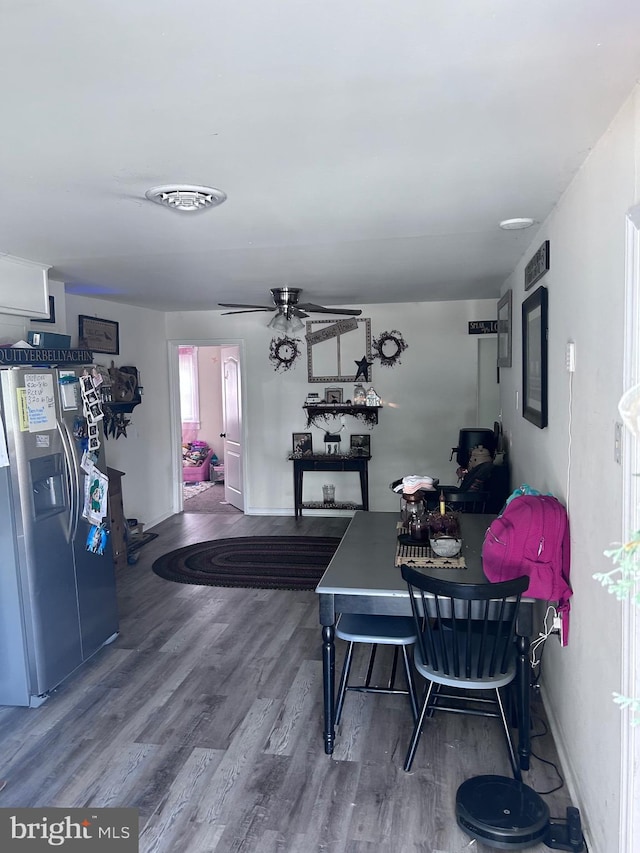 dining area featuring ceiling fan and hardwood / wood-style floors