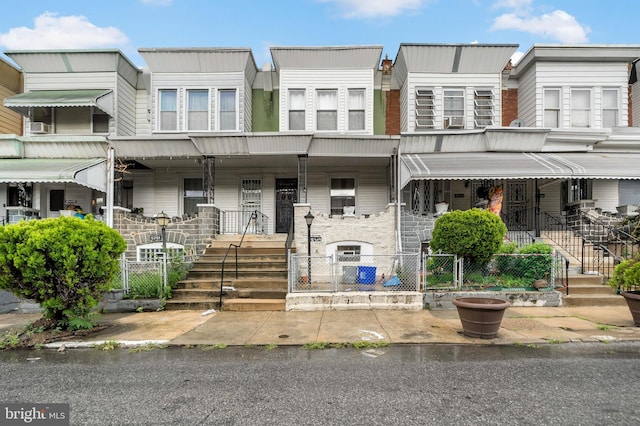 multi unit property featuring covered porch