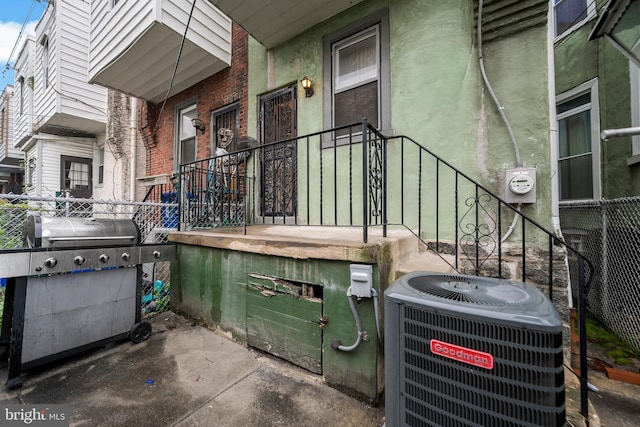 view of patio / terrace featuring central air condition unit