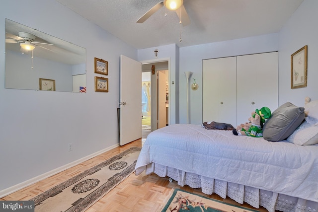 bedroom featuring light parquet flooring and ceiling fan