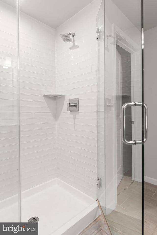 bathroom featuring walk in shower