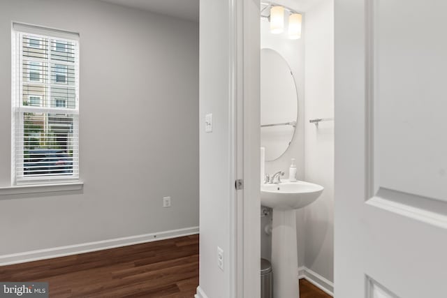 bathroom featuring hardwood / wood-style floors and sink