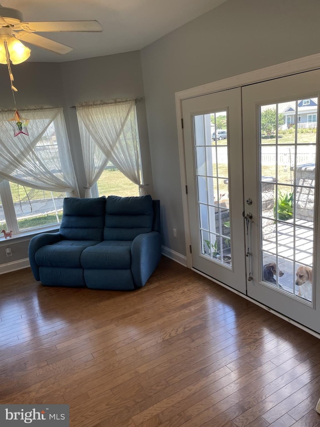 interior space featuring ceiling fan, dark hardwood / wood-style flooring, and french doors