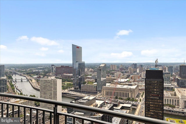 property's view of city featuring a water view