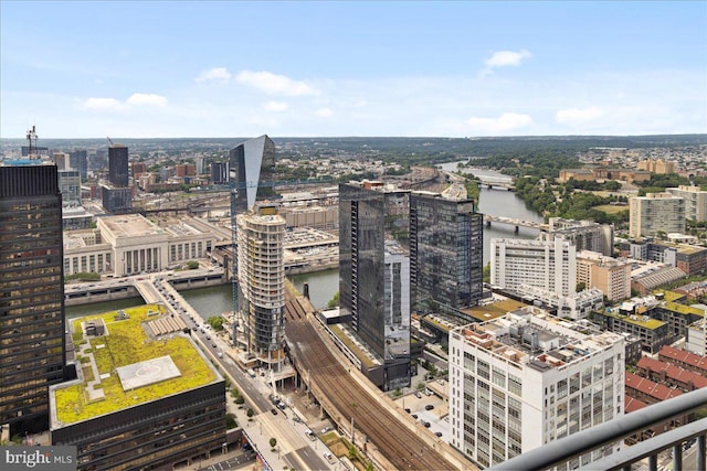 property's view of city featuring a water view