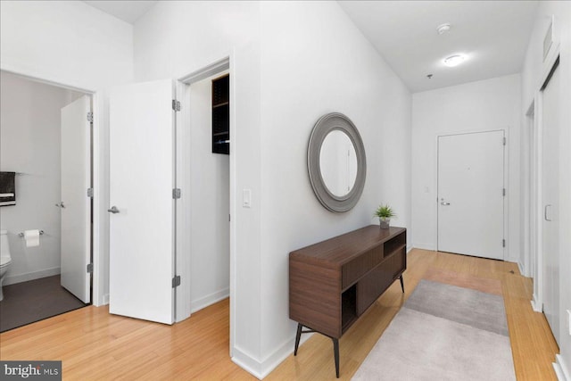 hall featuring hardwood / wood-style floors