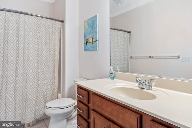 bathroom with vanity, crown molding, toilet, and tile patterned flooring