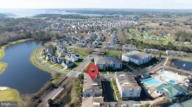 birds eye view of property featuring a water view