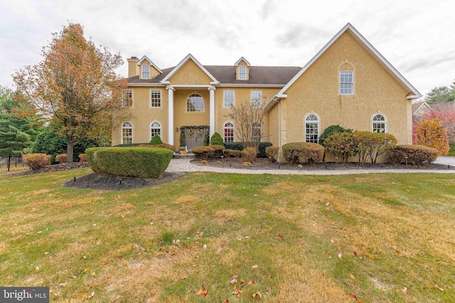 view of front of house with a front yard