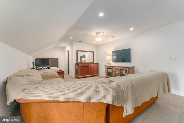 living room featuring light carpet, ceiling fan, and lofted ceiling