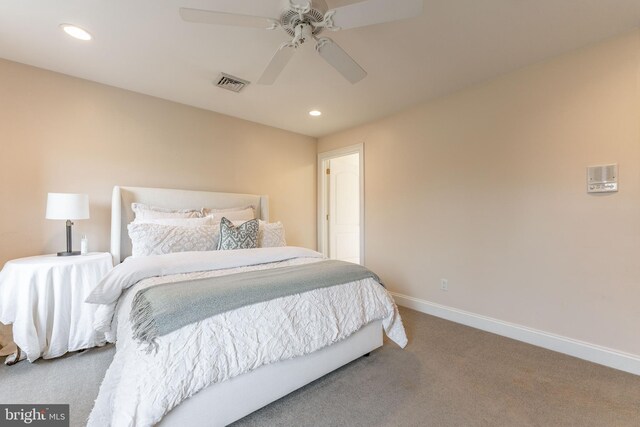 carpeted bedroom with ceiling fan