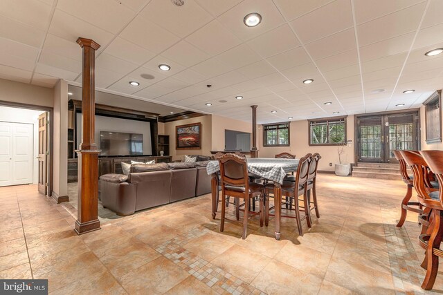 dining space with ornate columns