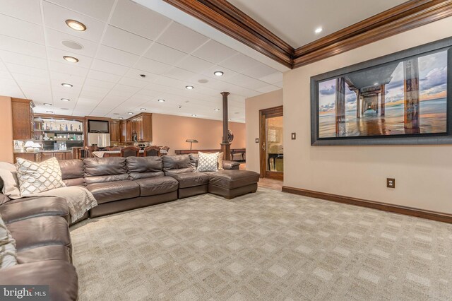 living room with light colored carpet and crown molding