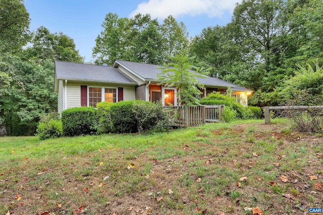 view of front of property with a front lawn