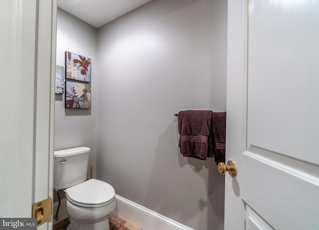 bathroom featuring toilet