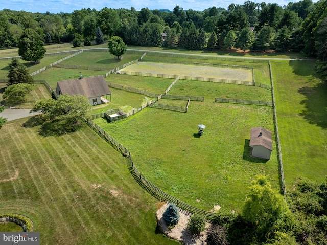 birds eye view of property featuring a rural view