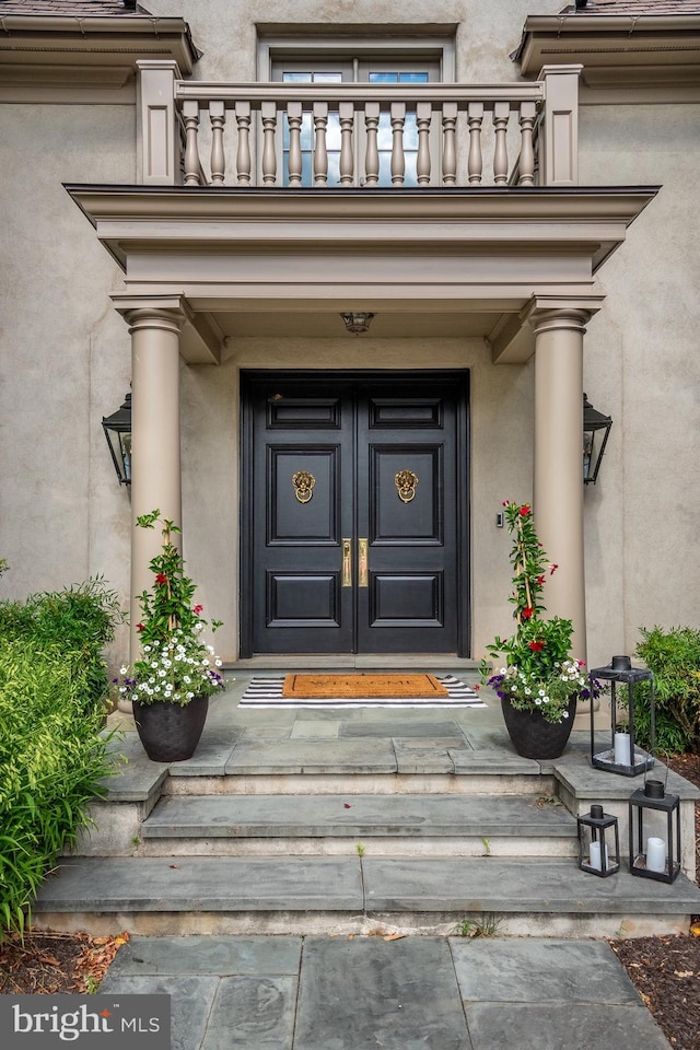 doorway to property with a balcony