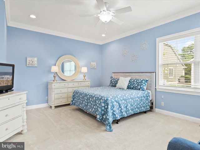 bedroom featuring ceiling fan, ornamental molding, and light carpet