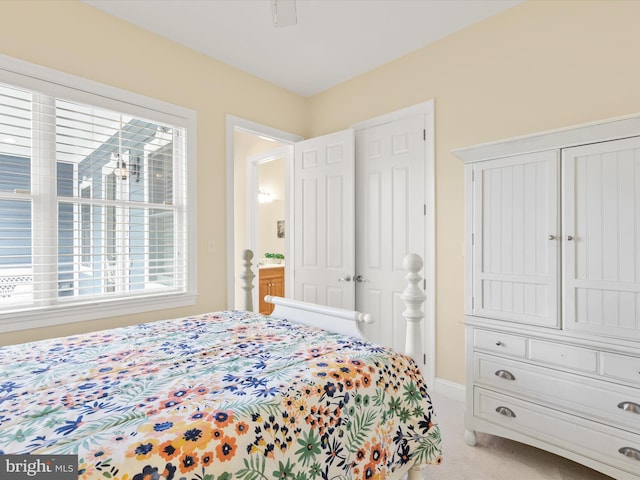 bedroom with light carpet