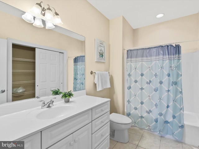 full bathroom with tile patterned flooring, vanity, shower / tub combo with curtain, and toilet