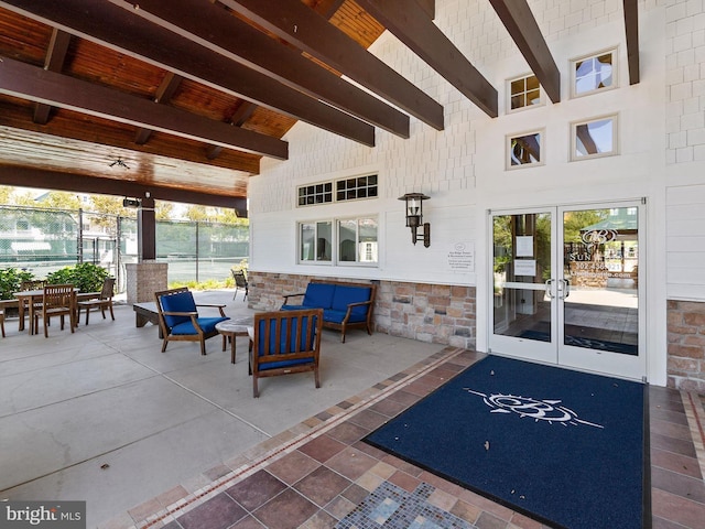 view of patio with outdoor lounge area and french doors