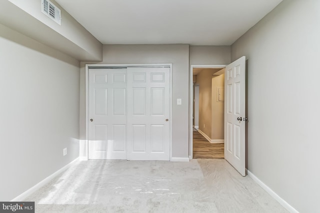 unfurnished bedroom with a closet