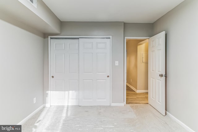 unfurnished bedroom featuring a closet