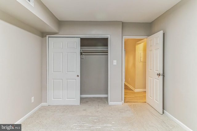 unfurnished bedroom featuring a closet