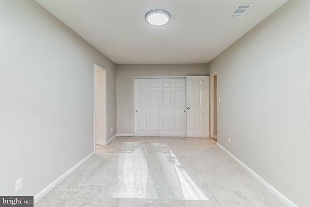 unfurnished bedroom featuring a closet