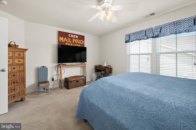 carpeted bedroom with ceiling fan